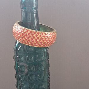 Elegant Gold and Pink Bracelet